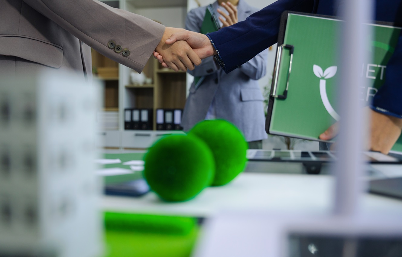 business people shaking after reaching an agreement