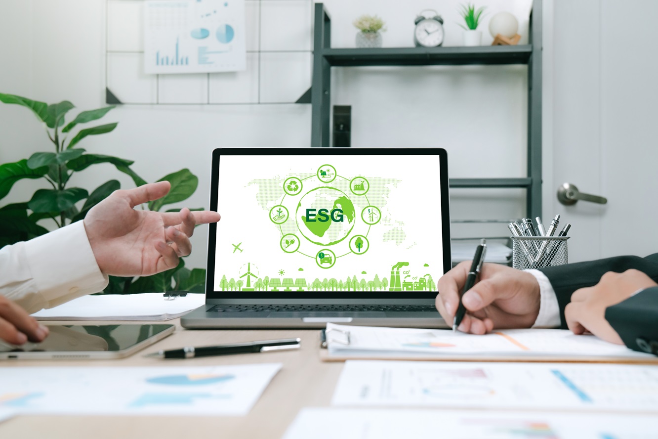 businessmen discussing esg investment trends and how to maximize them